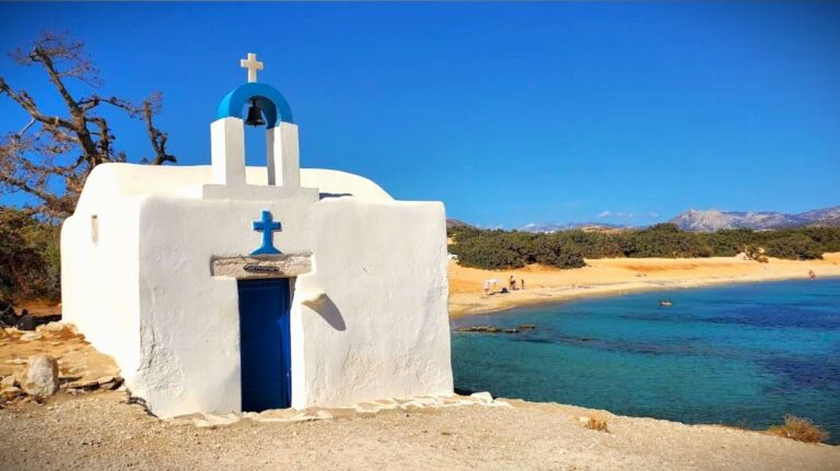 Naxos rent a car Alyko Beach chapel view with turquoise sea and sand dunes in Naxos Greece