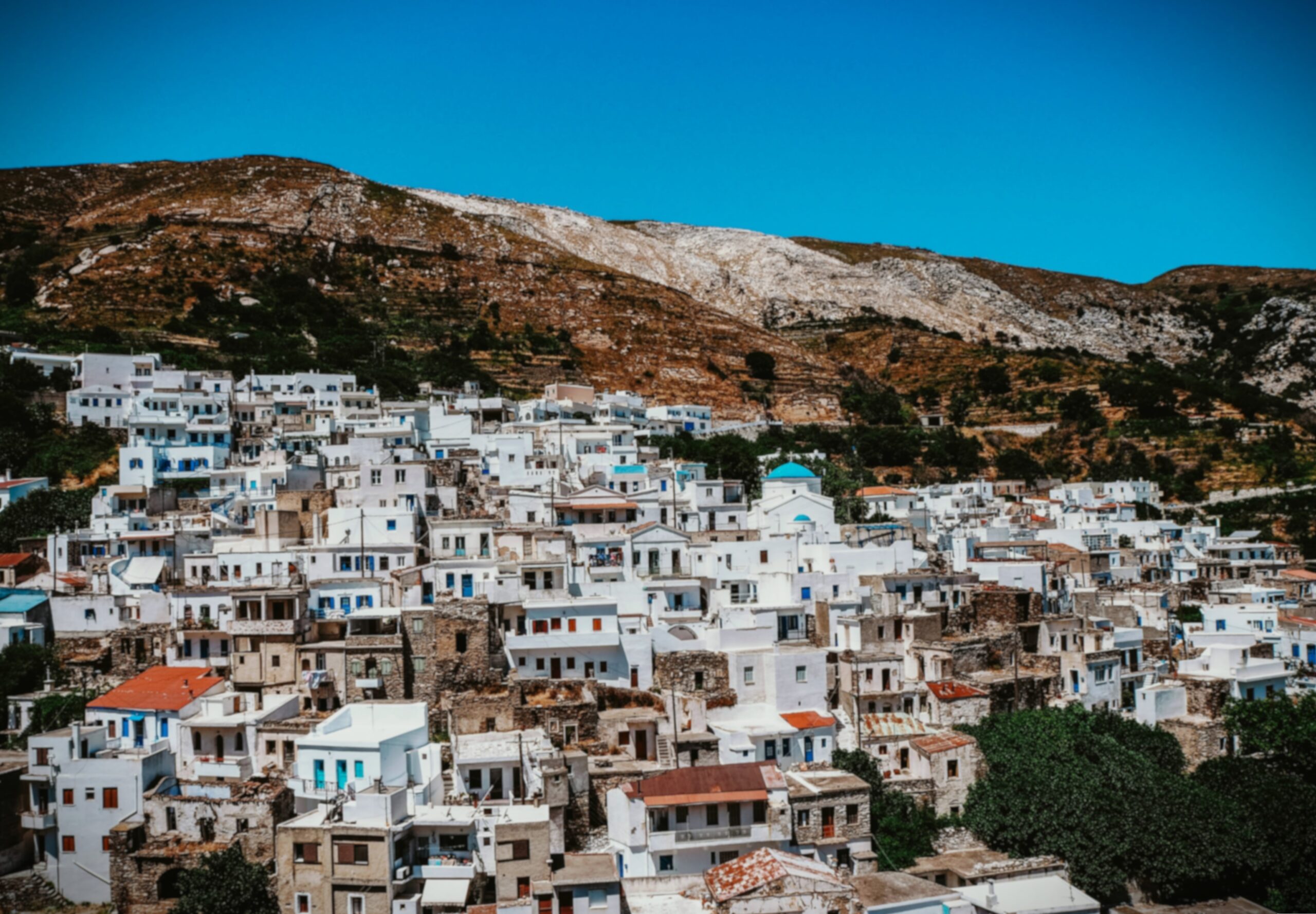 Naxos car hire Koronos village traditional houses mountain view Naxos Greece